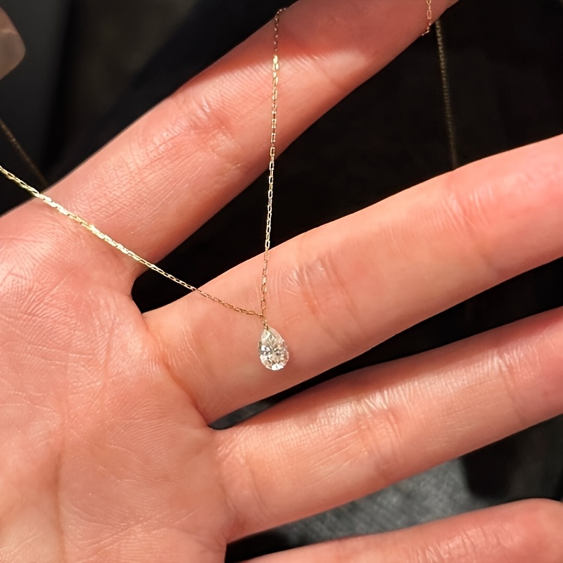 TEMU 1pc Uniquely Designed Exquisite Water Drop Synthetic Zirconia Necklace, Suitable For Women. This Beautiful Clavicle Chain Jewelry Is A For