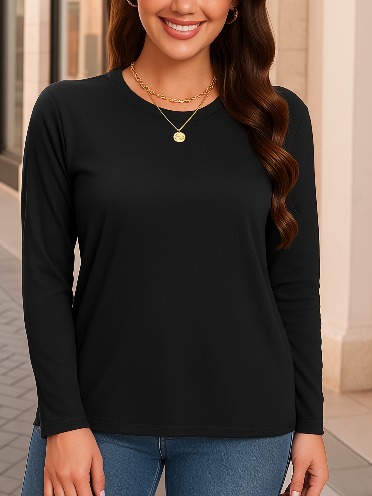 a solid   layer with a round neck and long sleeves suitable for daily use blending   with fashion