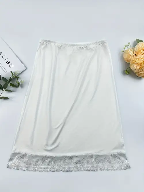 A Easy Yet Stylish Dress in a Solid Color, Featuring a Lace-Trimmed Elegant Underskirt A Easy Yet Stylish Dress in a Solid Color, Featuring a Lace-Trimmed Elegant Underskirt