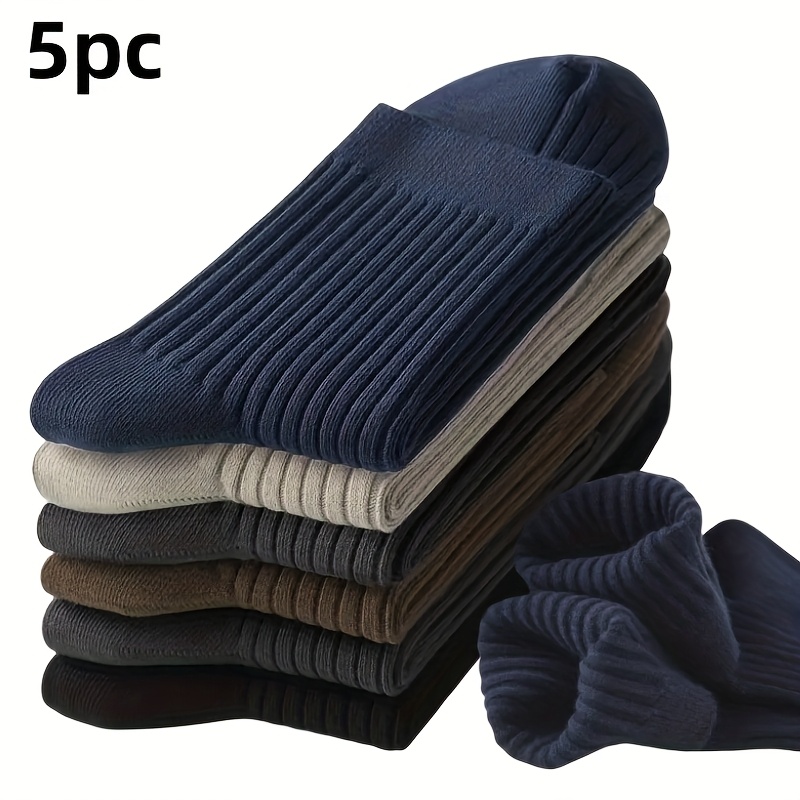 

A Set Of 5 Pairs Of Men's Minimalist Socks In Colors, Featuring A Solid That Exudes A Sophisticated Vibe. Mid-calf Socks Are Business Trips, , And Worn In Any Season.