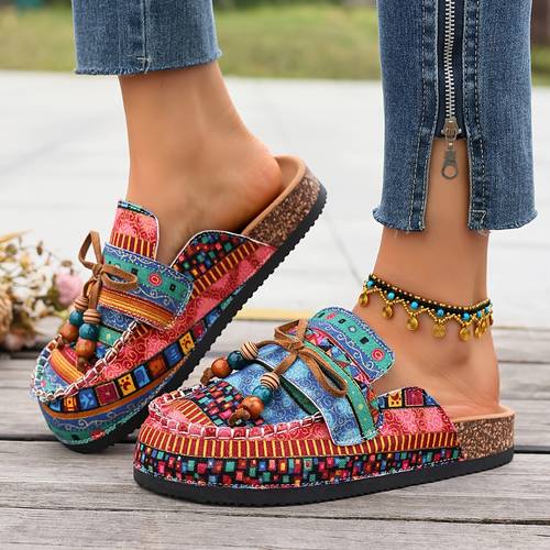 item picture womens casual versatile slip on mules for shopping and walking featuring a loose fit comfortable bohemian ethnic style with bow and beaded embellishments hand sewn bag toe design and wide sizing fit