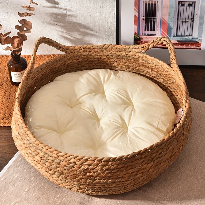 Image of A Round Cat Bed Made -woven Rattan, Designed To Be Durable And Suitable For Use, Perfect For Your Pet To Sleep In And Easy To Clean