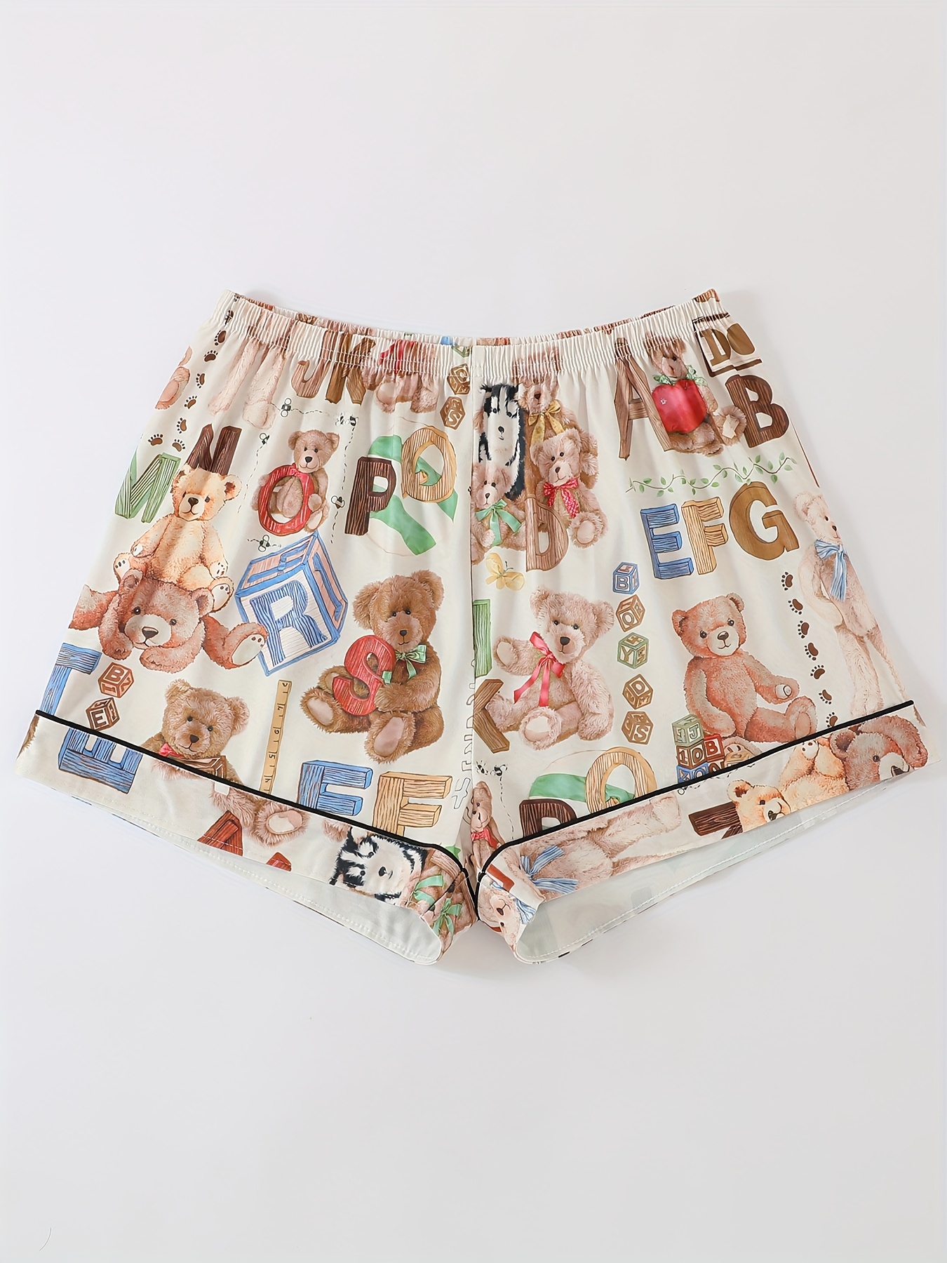 three piece ladies pajamas set with letters s cubes   and other printed patterns     outside with lapel short sleeved cardigan and loose elastic shorts and trousers casual   ladies pajamas and home clothes set Product details 4