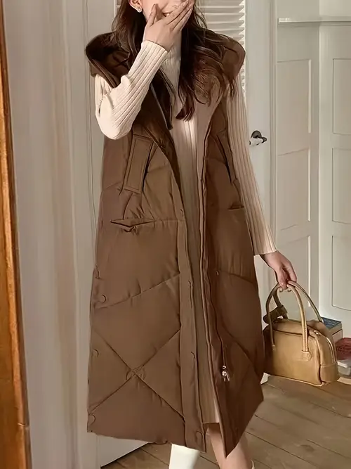 후드가 있는 긴 조끼, 미니멀한 캐주얼 스타일과 큰 포켓을 특징으로 합니다.