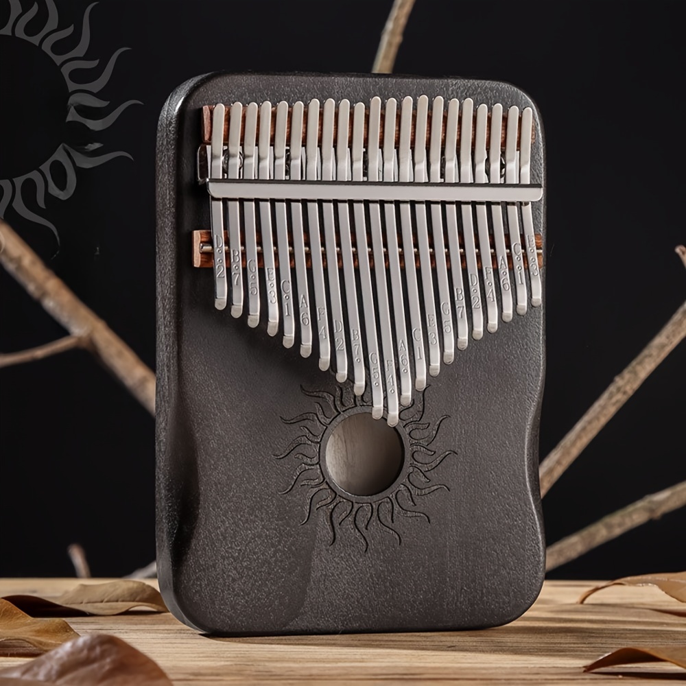 

Kalimba à 21 Touches - à Pouce en Bois , Mbira Portable avec Marteau d' & Accessoires - Idéal pour Débutants & Cadeaux