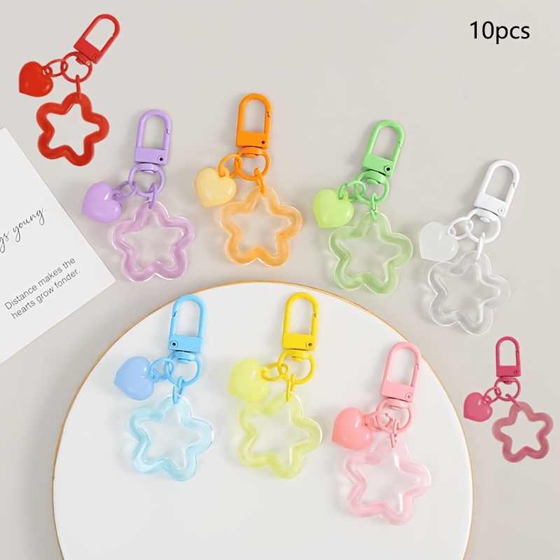 TEMU 10 piezas de llaveros pequeños de resina con forma de y estrella de puntas aleatorios - Diseño colorido de y estrella de puntas, colores