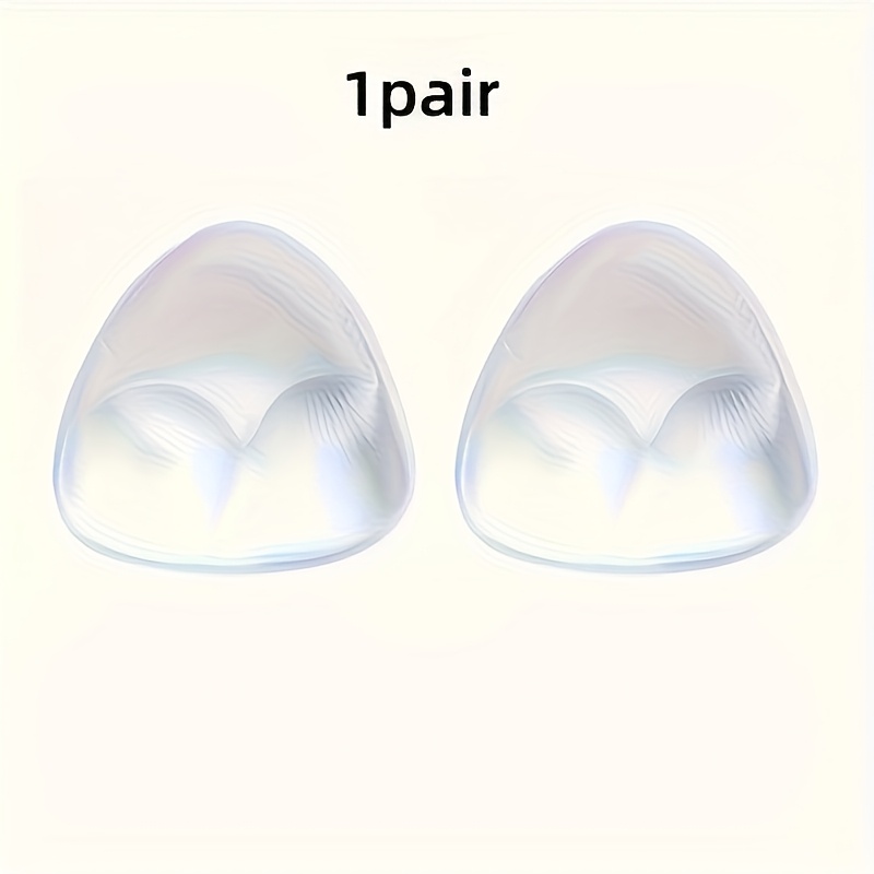 A Set Of Silicone Inserts For Women's Bras, Designed To Enhance The Bust With A Triangular Shape
