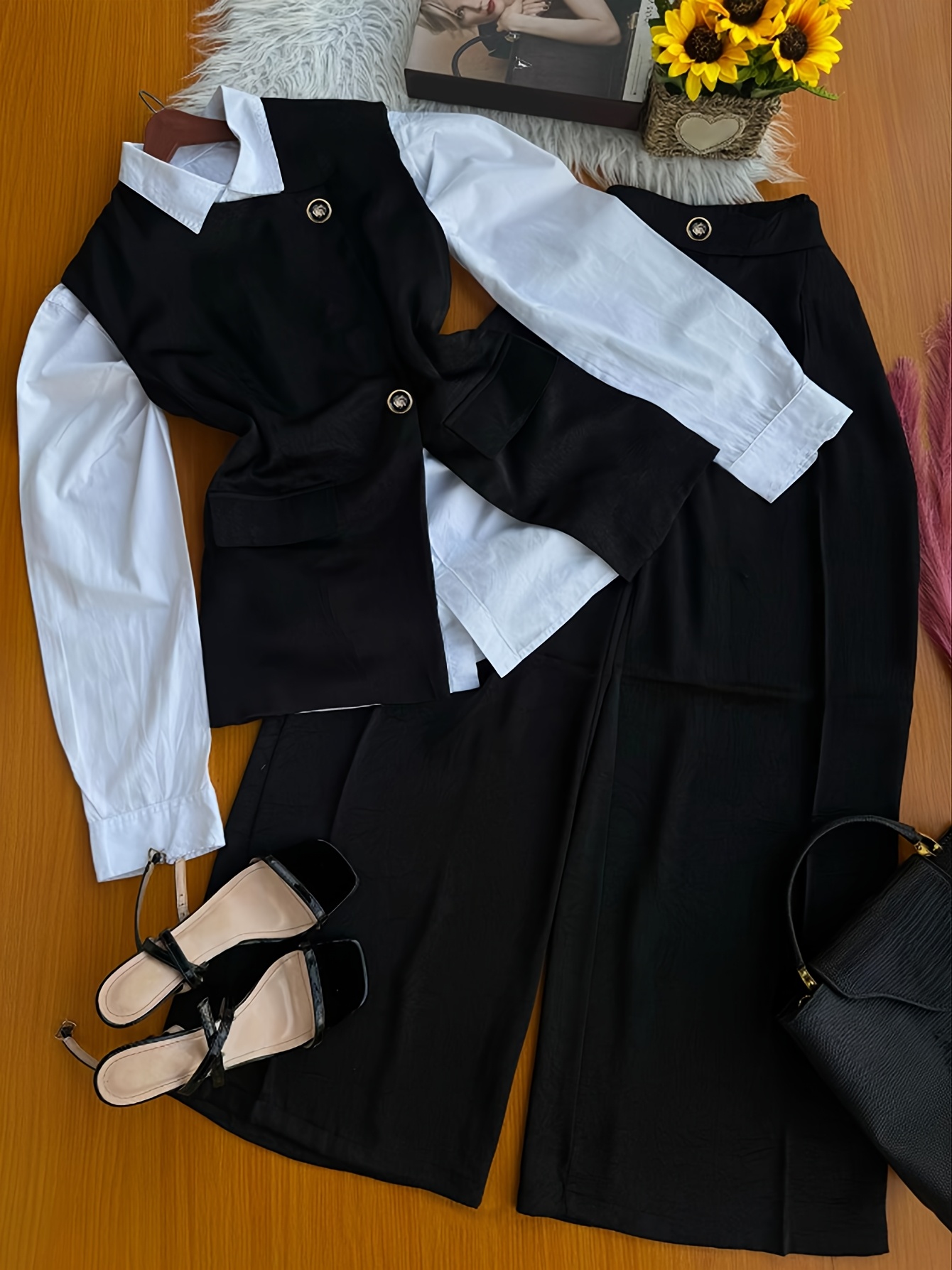 The Newness Executive Office Pantsuit A sophisticated pantsuit in sharp chic design perfect for the modern professional