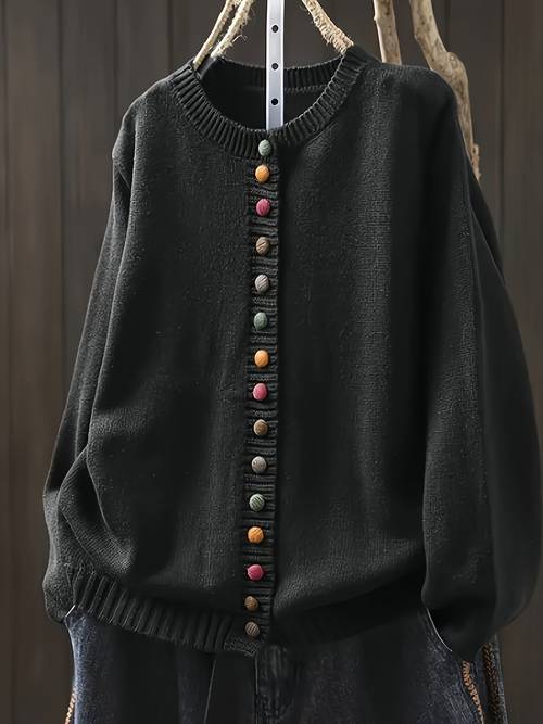 round neck cardigan with a colorful contrasting button featuring loose long sleeves for a vintage artistic and casual everyday look