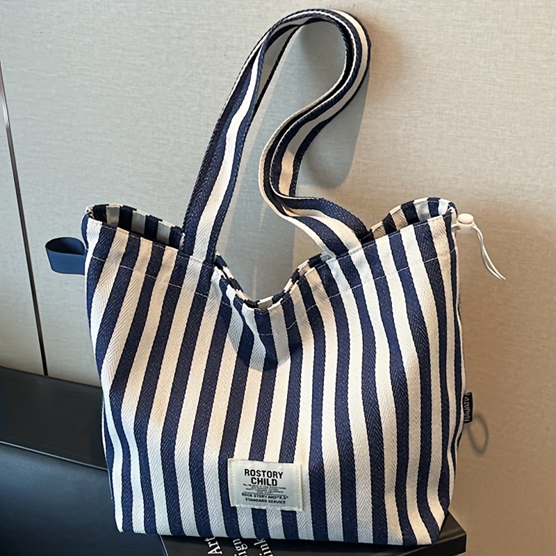 TEMU 【商品名】おしゃれなレディース カラーブロック ストライプ柄 ショルダーバッグ。大容量で、夏のバケーション、ビーチ、ショッピングに最適。広々としたトートは、仕事、ショッピング、ダイニングに使える万能ハンドバッグです。