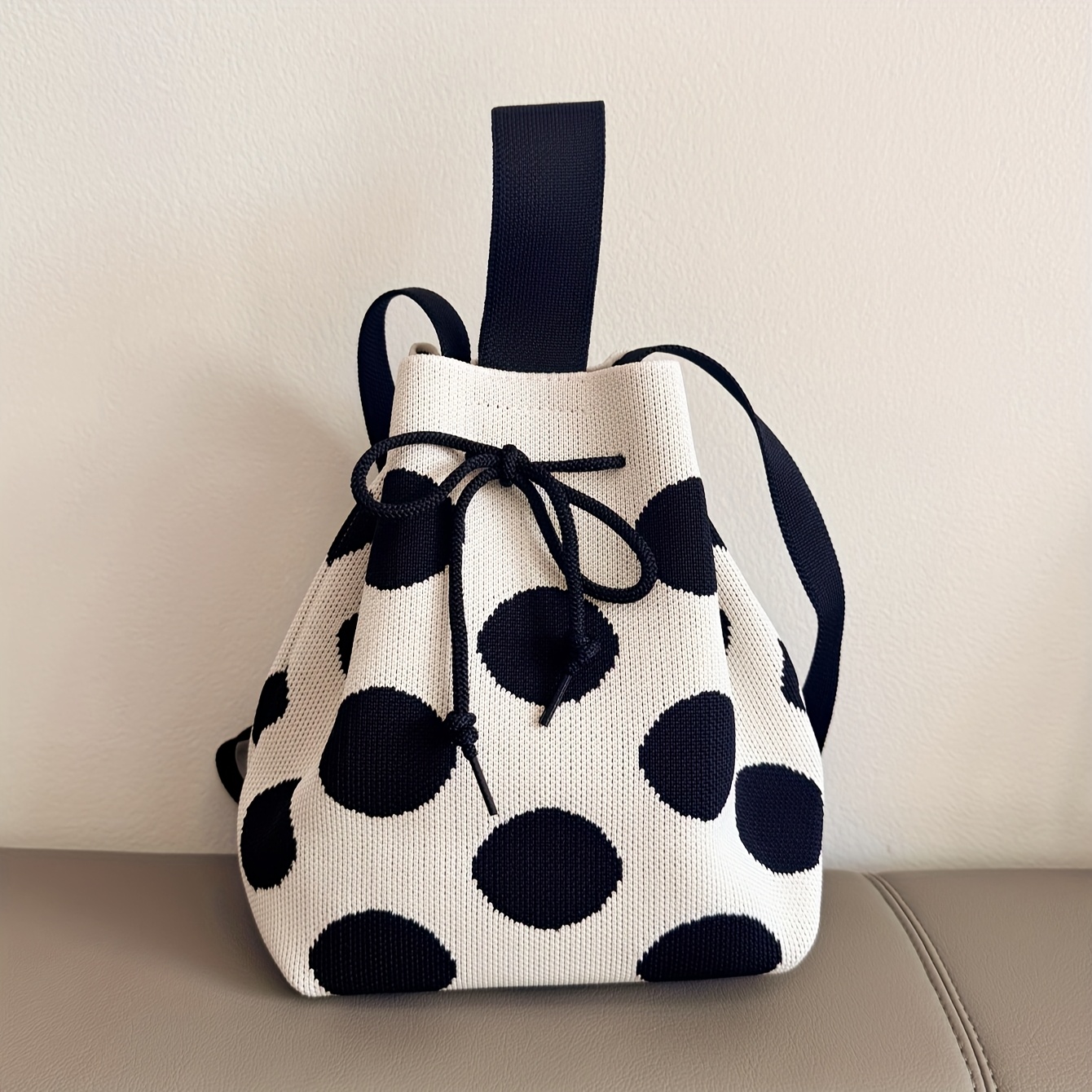 Image of New Polyester Knit Polka Dot Bag! This Bucket Bag Features Black And Scheme, Exuding Retro Charm With A Minimalist Yet Style. The Serves As A Visual Point, Making It A Trendy Must-have