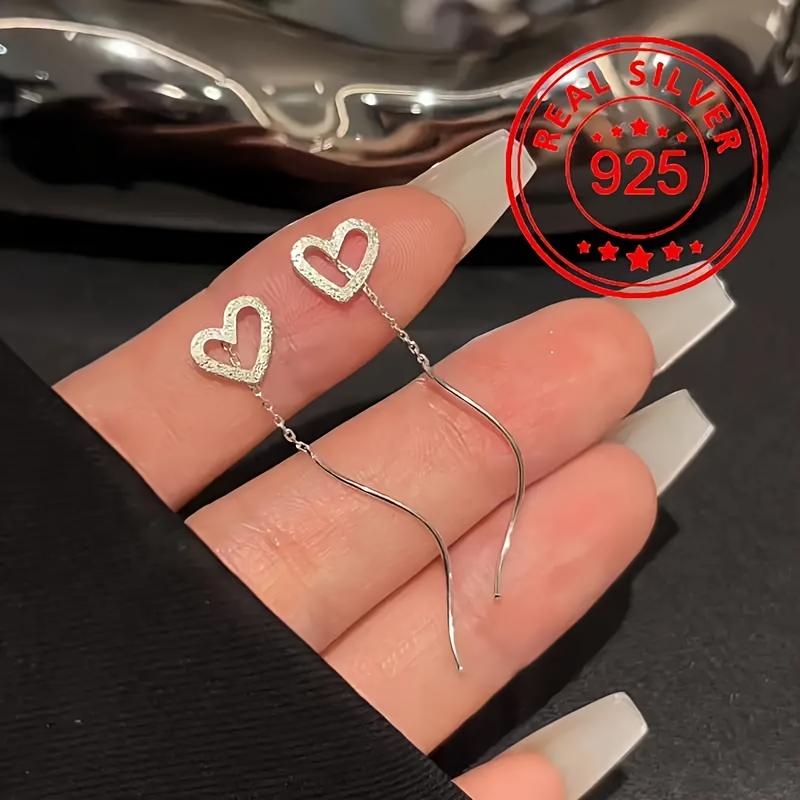 Elegant 925 Silver Hypoallergenic Earrings With Hollow Heart-shaped Design, Suitable For Women To Wear On Dates With An Elegant .