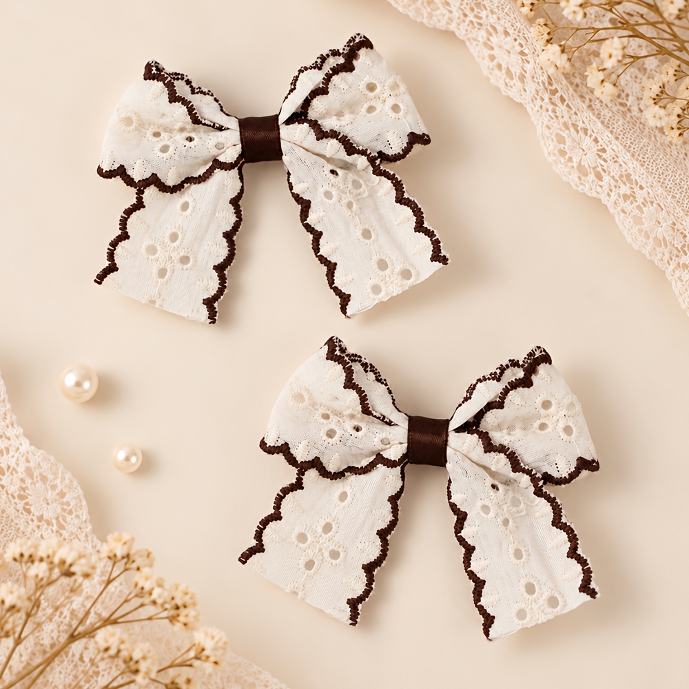 TEMU 2pcs Pinces à Cheveux avec Nœud à Oeillets, Nœud en Ruban Brodé Creux Blanc avec Barrettes Crocodiles Mousse Brunnes pour Femmes, Fournitures de