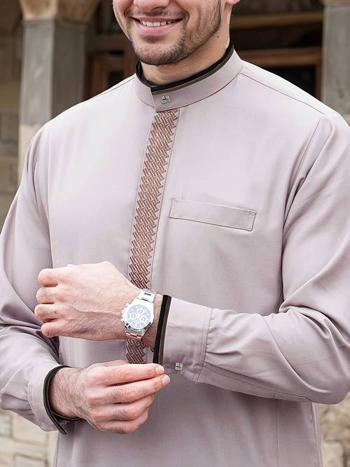 a mens eid al sacrifice and eid al traditional middle eastern cultural attire purple long sleeved stand up collar robe with geometric embroidery suitable for making it a suitable gift for