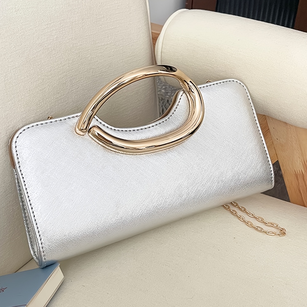Elegant Metallic Handbag with Oval Metal Handle and Chain Strap