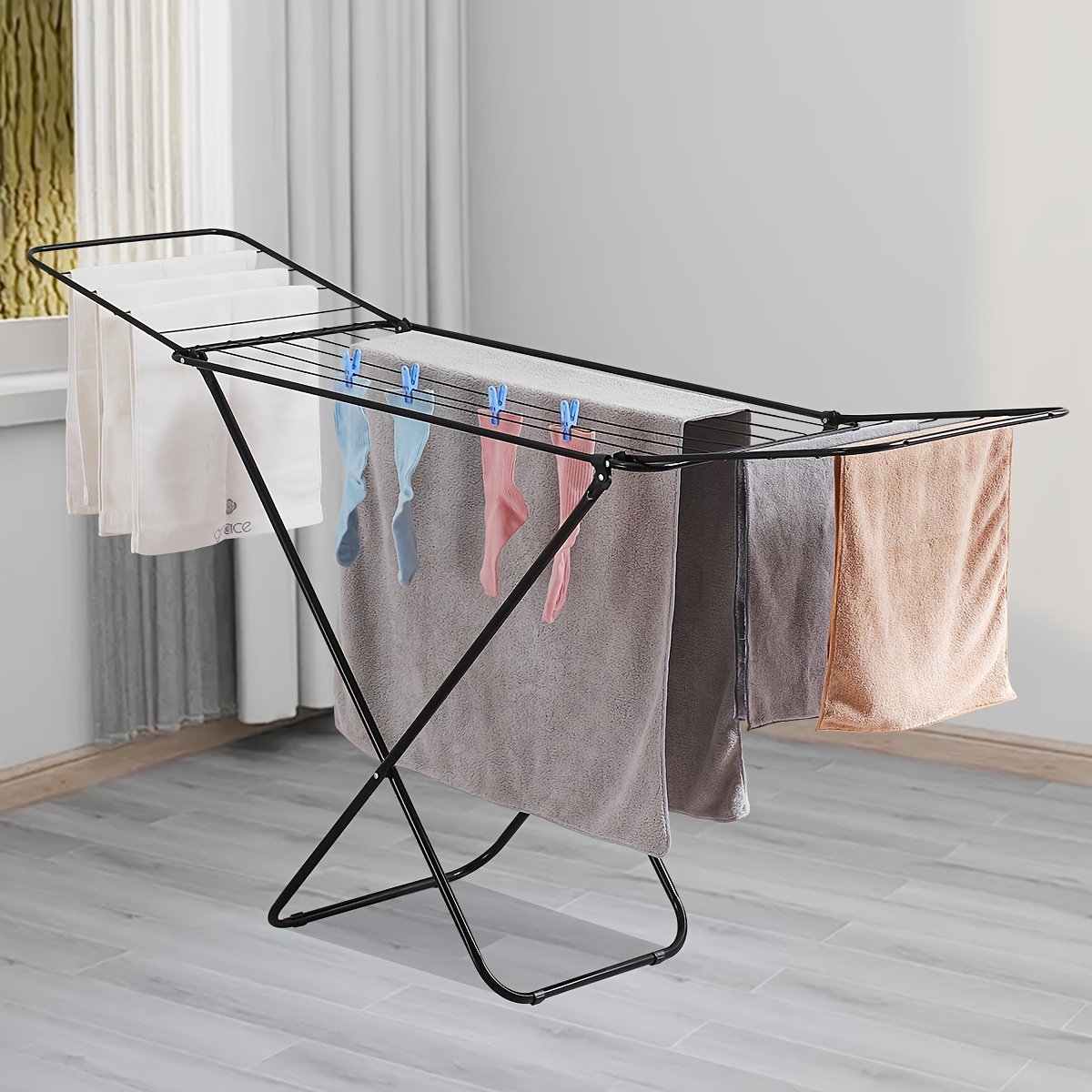 

Space-saving Black Metal Foldable Clothes Rack - Indoor/outdoor Drying Stand For Balcony & Bay Window