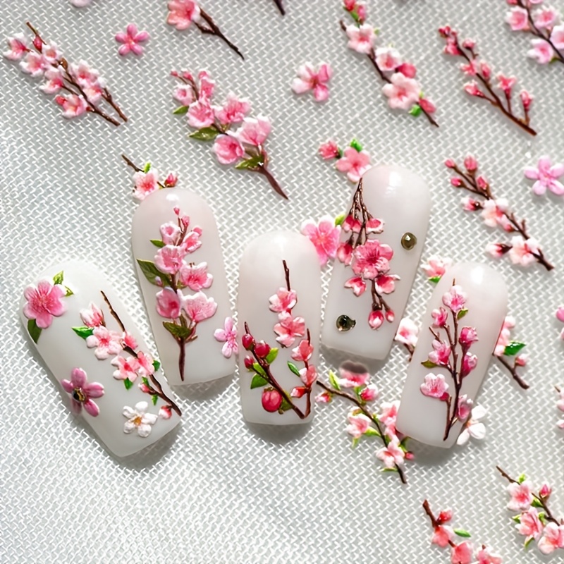 1 peach flower themed nail art sticker containing