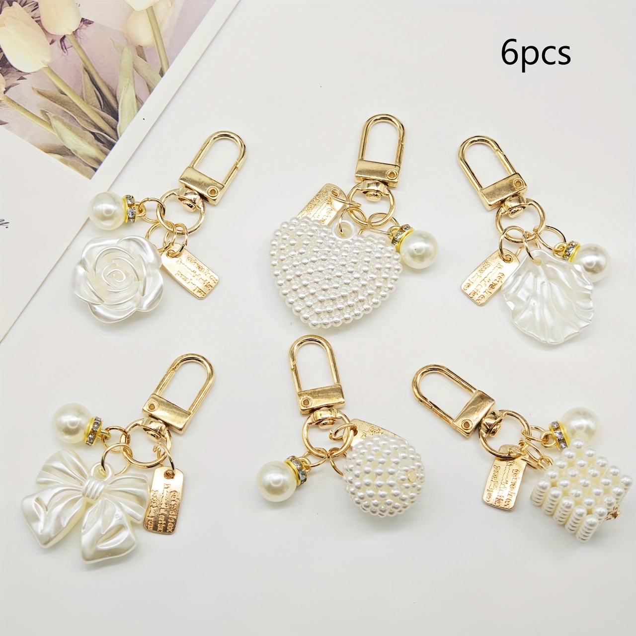 Image of 6pcs Elegant Pearl & Golden Keychain Charms - Heart-shaped Resin Pendants With Lobster Clasp, Ideal For Earphone & Bag Decor, Perfect Valentine's Day Gift, Cute Keychain Accessories