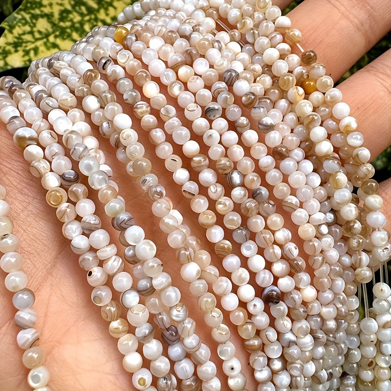 

3mm Natural Color Shell Beads. Natural Mini Round, About 130 Natural Beads Per Strand, Suitable For Making, Necklaces, Bracelets, Earrings, Craft Decorations