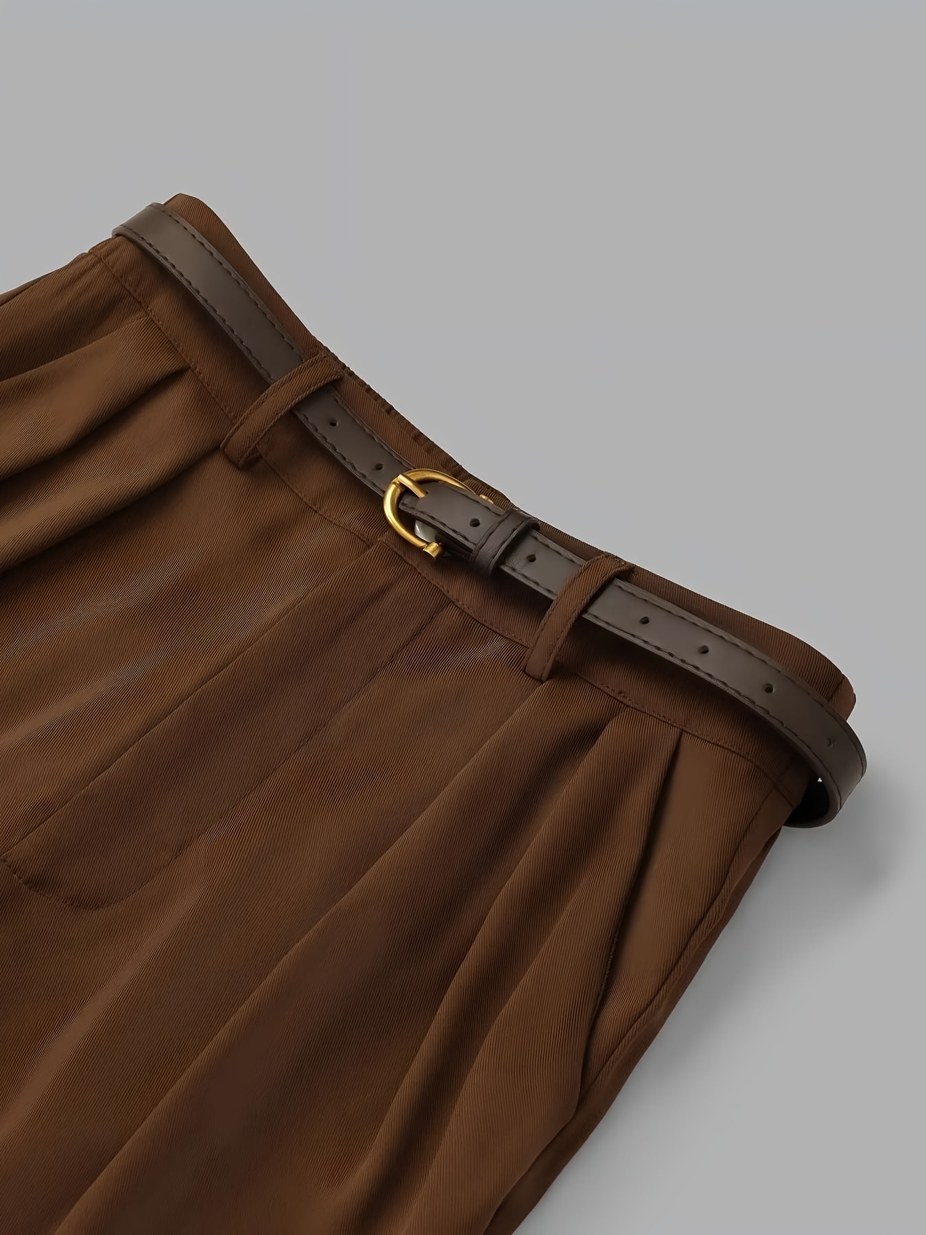 Model wearing the complete short-sleeve polo shirt and casual pants outfit