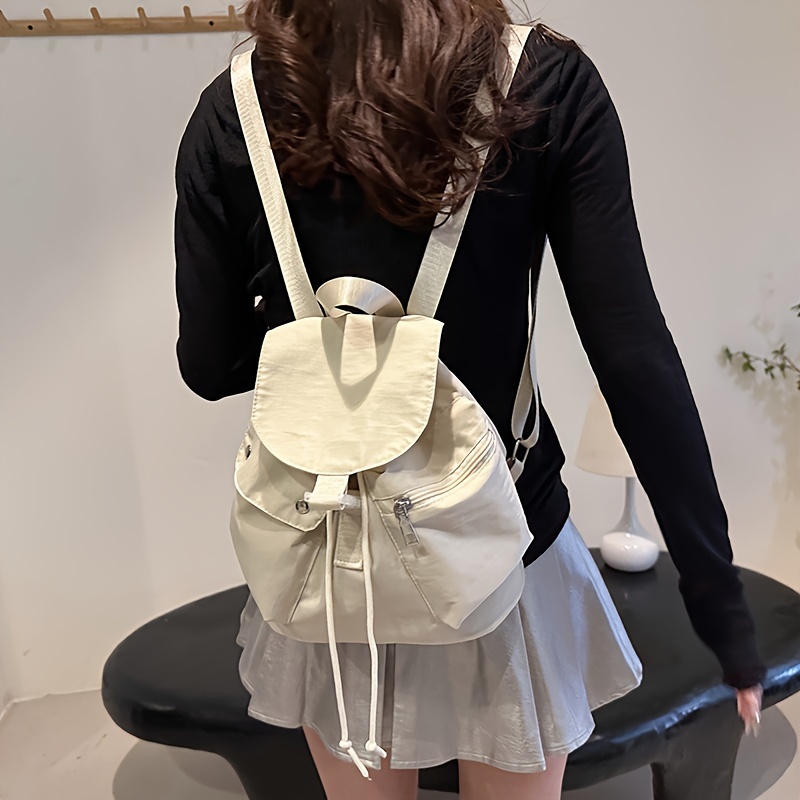 

Simple And Stylish Canvas Backpack With Adjustable Shoulder Straps, Multiple Compartments, And Nylon