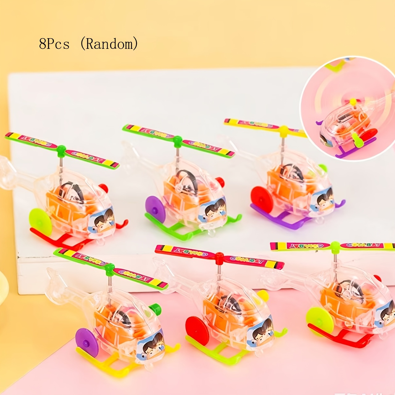 Image of 8pcs Random Spring-powered Glider Toy, No Electricity, Rotate By Itself, Novelty Small Toy, Birthday Party Small Gift; Christmas Halloween Gift; School; Classroom Reward