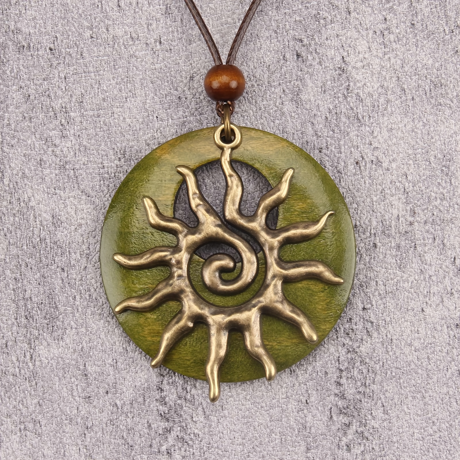 Image of A Unisex Vintage Bohemian Sunflower Necklace In Multiple Colors With Adjustable Leather Cord, Perfect For Modern Artistic Daily Wear