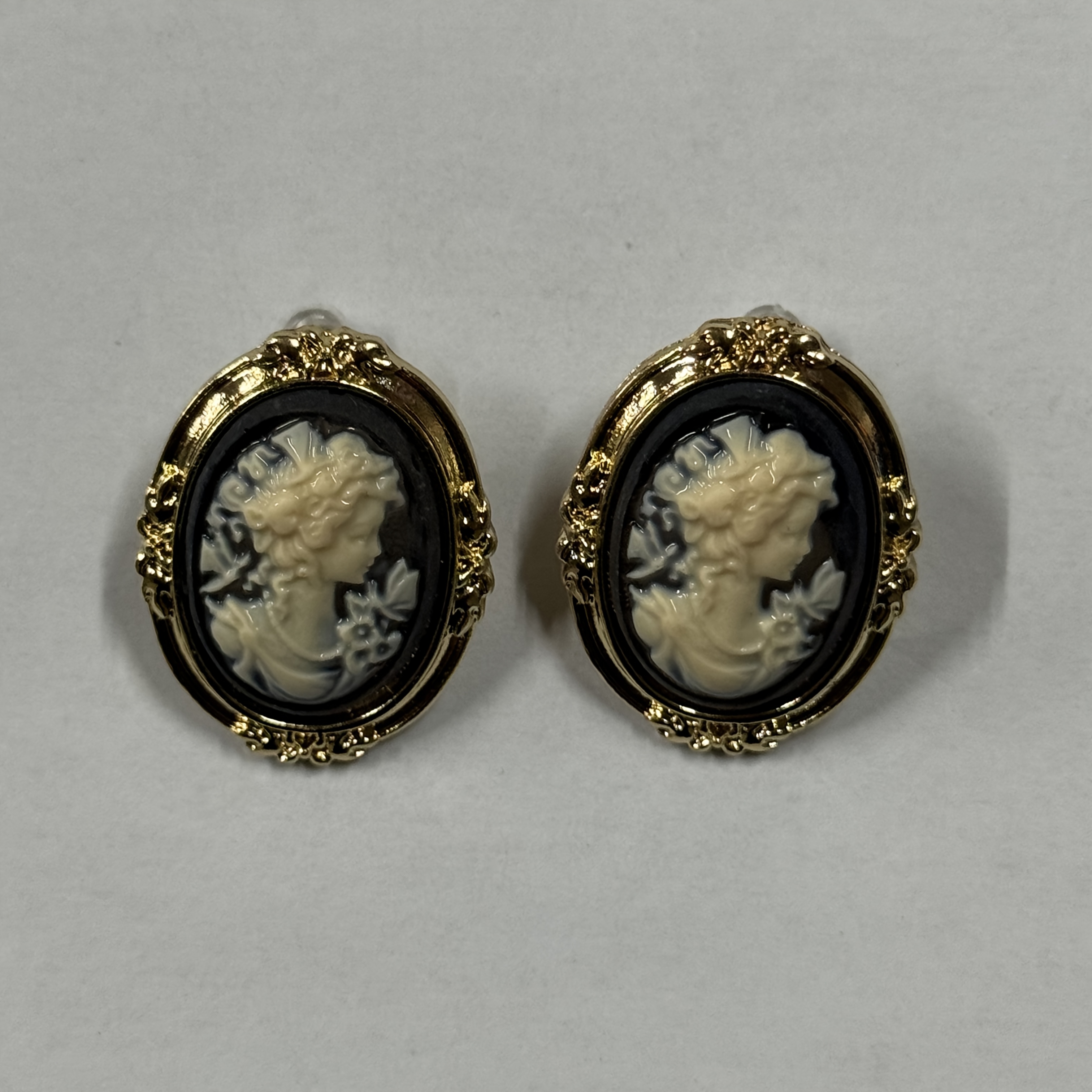 Image of Pair Of Fashionable Beauty Head Exquisite Relief Stud Earrings