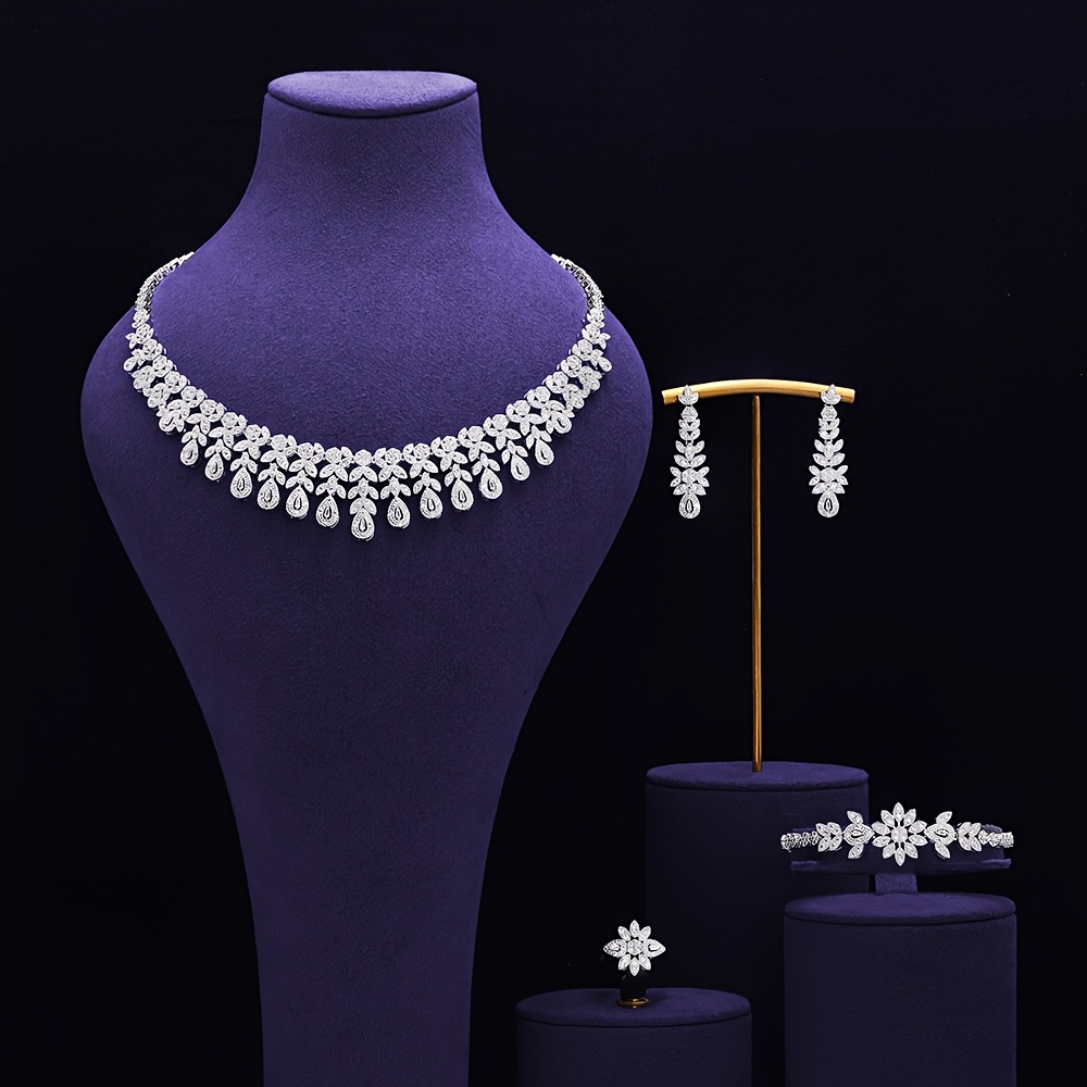 luxury 4pcs jewelry set inlaid with cubic 3a zirconia suitable for womens bridal parties and wedding accessories in saudi arabia and dubai