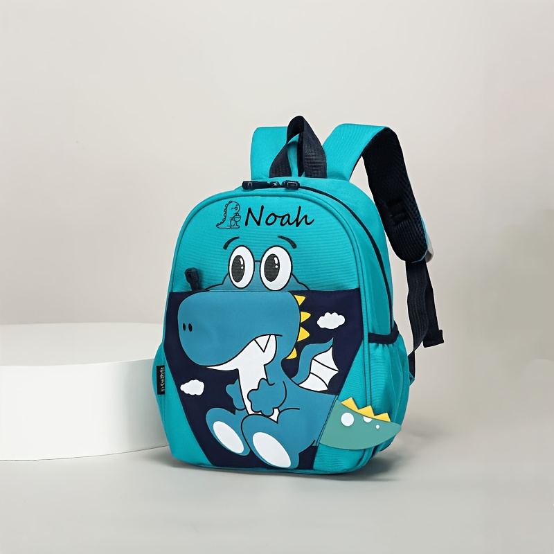 TEMU 1pc Back-to-school Personalized Dinosaur Women's Backpack, Customizable With Your Own Name, Text, Or . Features A Cute Cartoon Dinosaur Print
