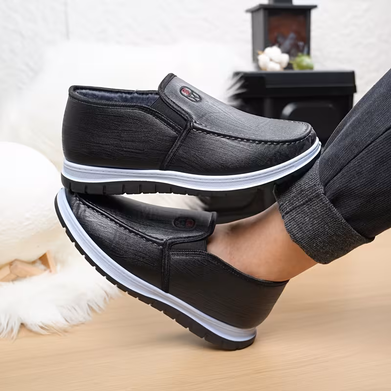 mens winter boots slip on ankle boots with a flat design black insulated footwear featuring thickened warm lining low heeled round toe non slip solid color minimalist style outdoor pvc sole hiking shoes Product details 4