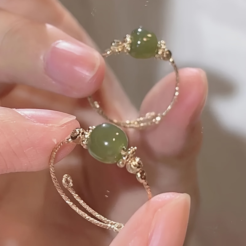 

Bague Élégante en Perle de Vert avec Métal Doré – Design Intricat, Bijoux Luxueux pour Tous pour Femmes, pour les Fêtes ou le Port