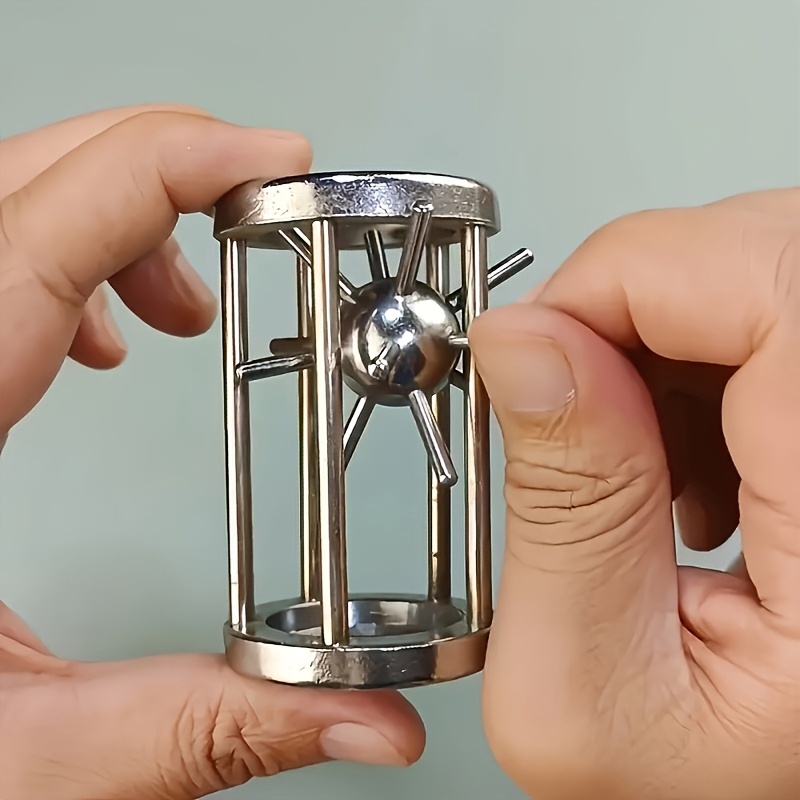 Image of A Stainless Steel Puzzle Ball That A Challenging 3d Brain Teaser For Adults, Making It An Ideal Gift For Valentine's Day Or Birthdays For Men And Women, And A Fun Party Trick For Aged 14 And Above