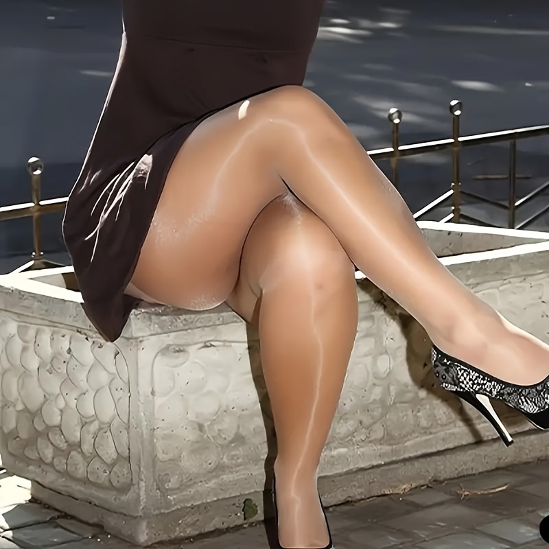 Shiny And Smooth Ultra-Thin Pantyhose with a Sexy Sheen, Perfect for Summer in a Reflective Nude Color.
