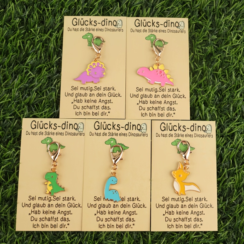 Image of 5pcs 2d Cute Dinosaur Keychain Set, With " Dinosaur" Card, With Keychain, Travel Storage Bag, And Carry On Handbag, Suitable For To Colleagues, , And On Birthdays, Before Exams, Or In Case