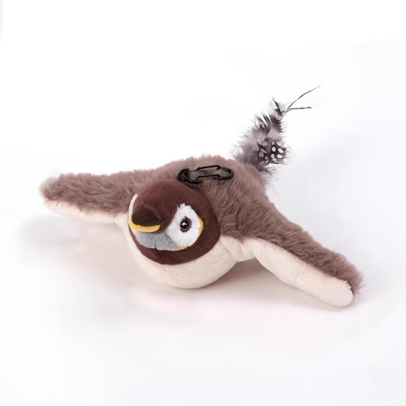 This * *ive Cat Toy Features a * Design That Flaps Its Wings to * Cats. It * with Artificial Feathers And * Bird Sounds to Better Capture The Cat'S Attention. The Fluffy *, * with a Hanging String, Allows Owners to * More * with Their Cats.