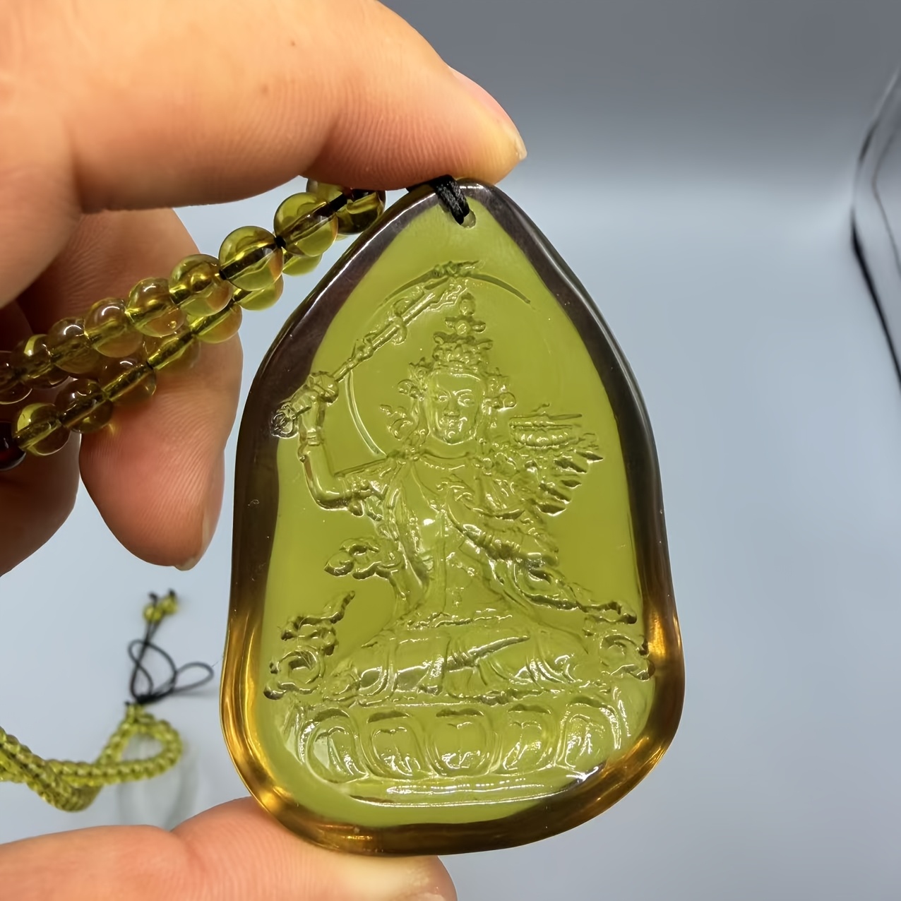 Dominican Amber Ksitigarbha Bodhisattva Pendant Necklace