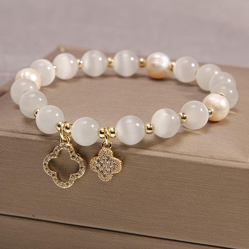 

Elegant White Glass Bracelet With Four-leaf Charm - Perfect For Fashionable Teens
