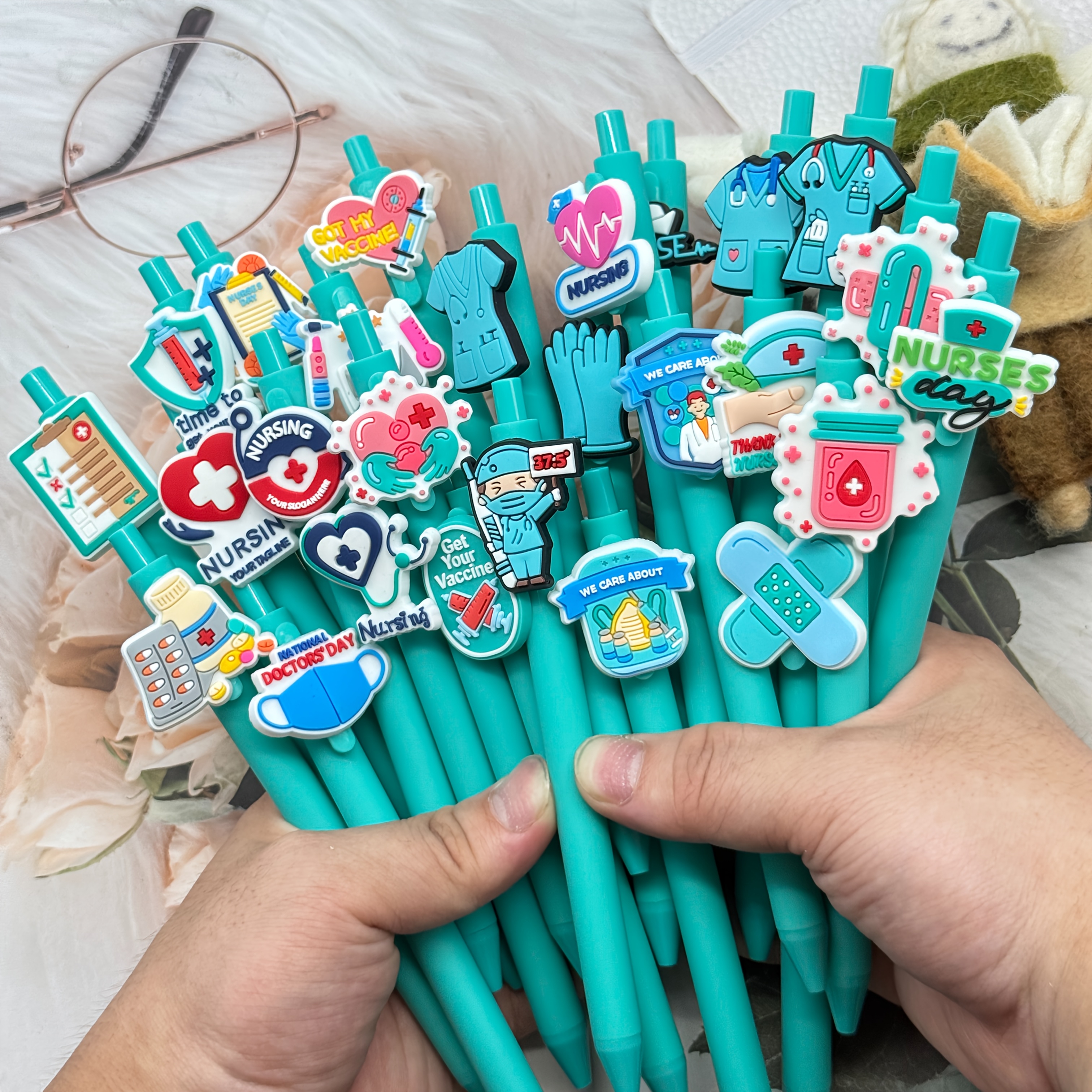12 25 retractable ballpoint pens from   series in teal color designed for   and nurses featuring   mechanism with black ink refills       documents and a   stationery gift Product details 2