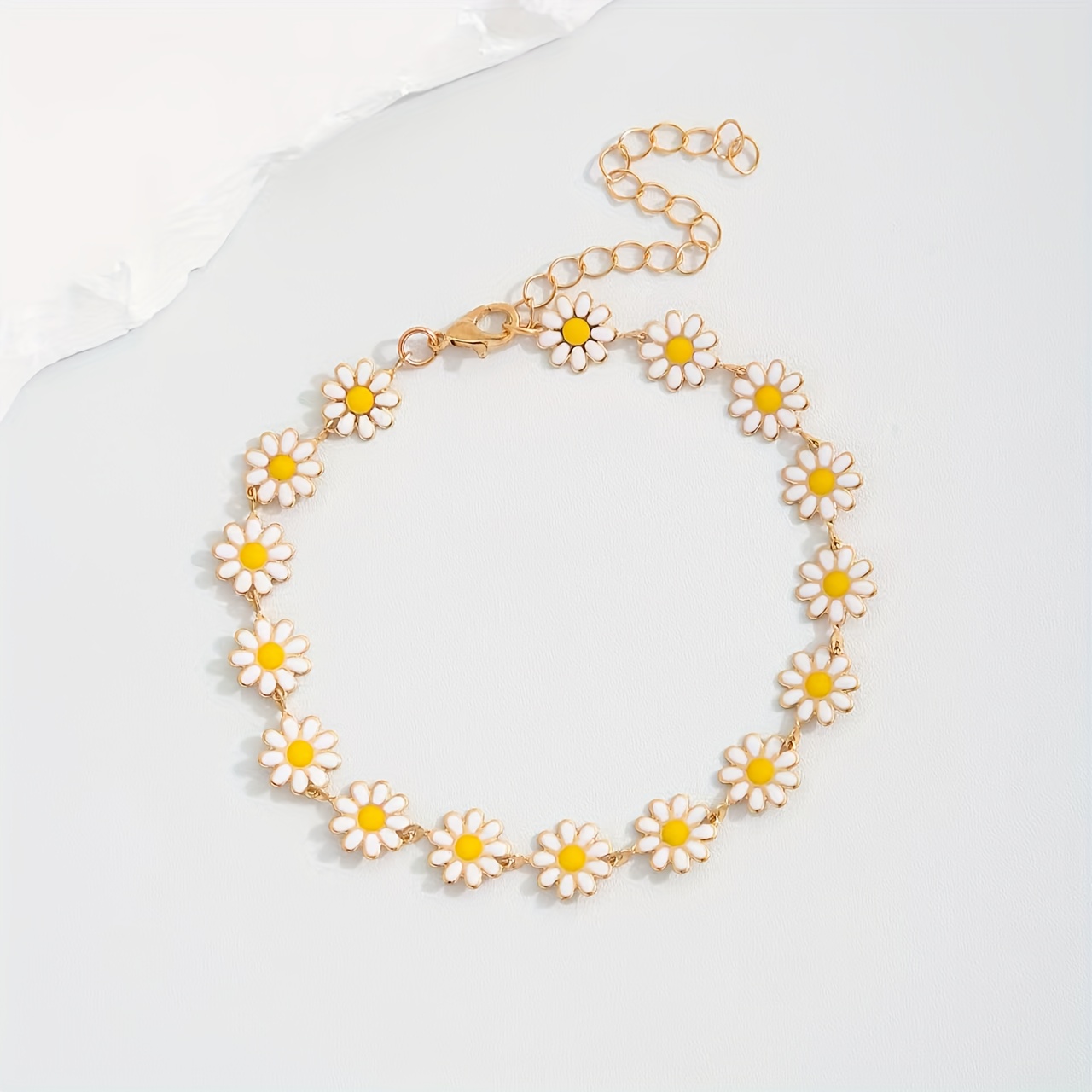 E-shop Europäische und amerikanische, süße, frische Damen-Fußkette mit Gänseblümchen aus Edelstahl, modische, florale Fußkette im pastoralen Stil,