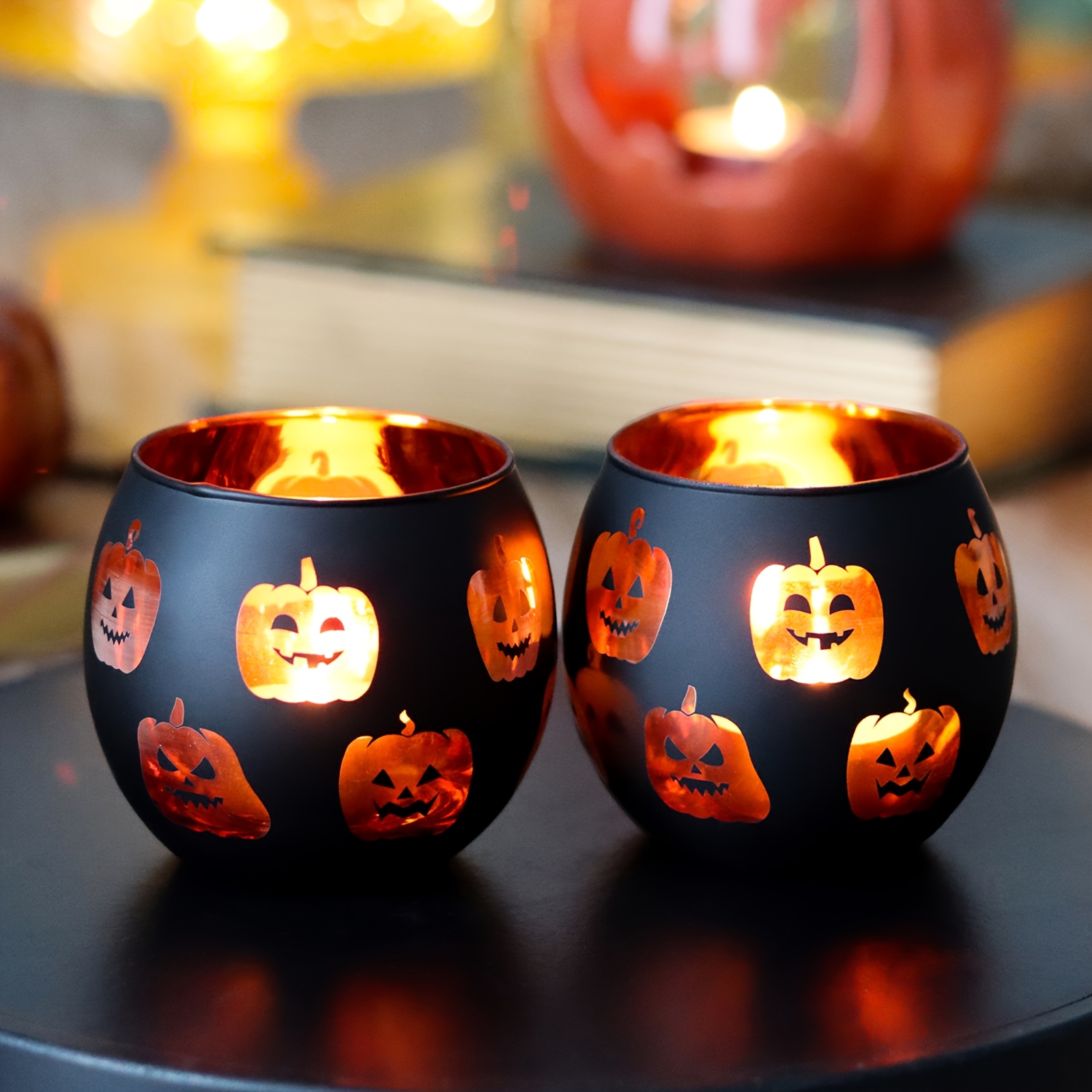 Image of A Set Of 2 For Halloween Candle Holders Featuring Fun Pumpkin Faces In , Perfect For Festive Home Decorations For Parties And Costume Events, Making It An Ideal Gift For Halloween Enthusiasts