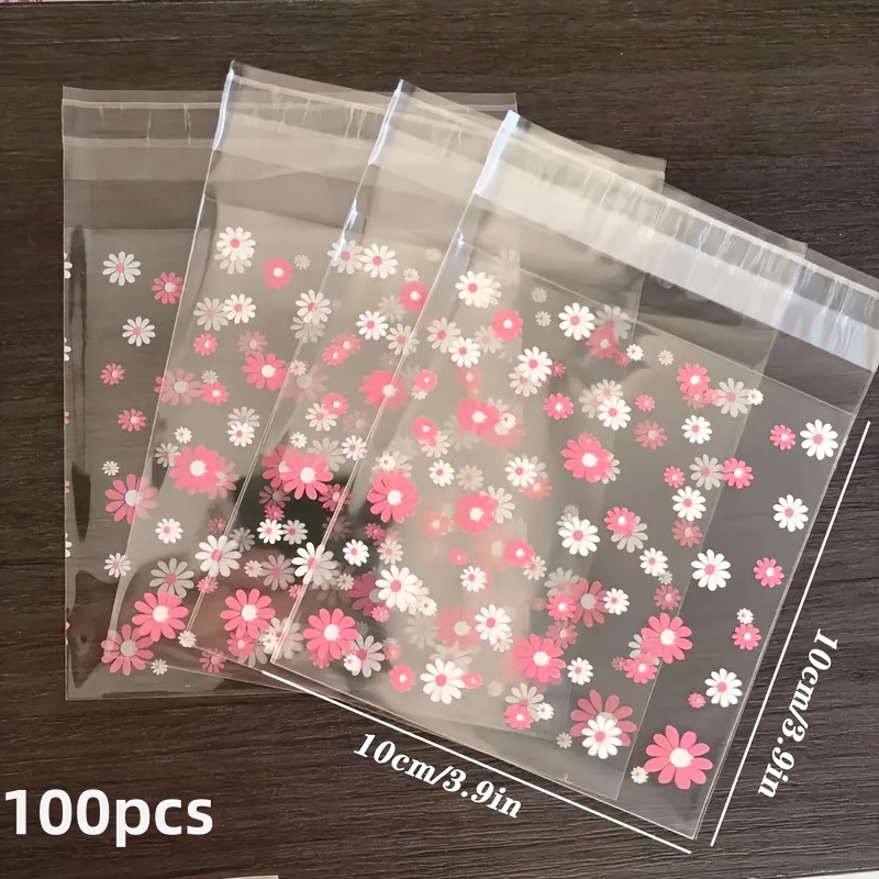 TEMU 100pcs Sac d'emballage transparent, joli petit sac d'emballage OPP transparent rose et blanc avec marguerite, sac d'emballage jetable pour