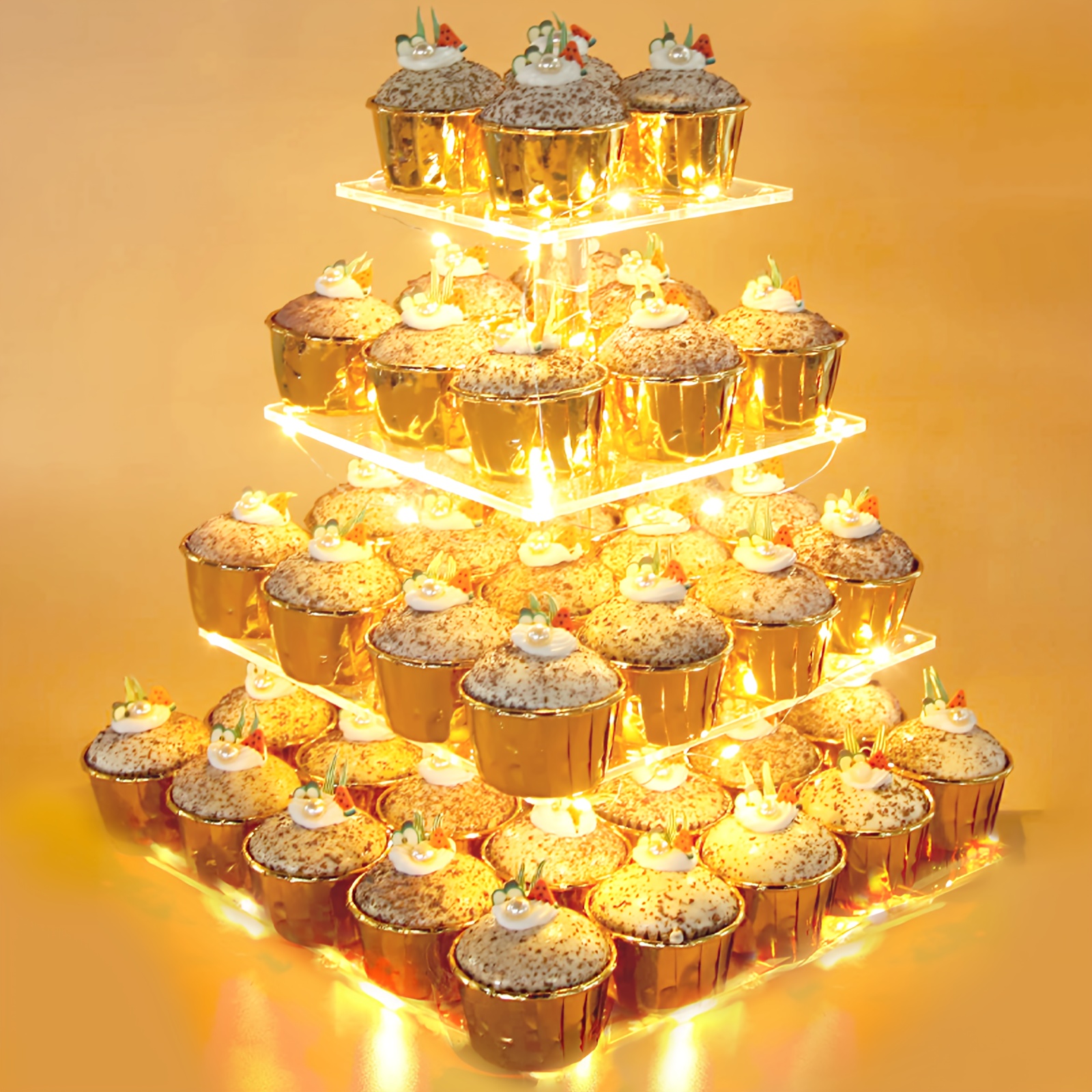   display four layer square cake stand made of and sturdy acrylic featuring a warm yellow led light strip   of holding 52 cupcakes ideal for weddings birthdays celebrations christmas family reunions and graduations