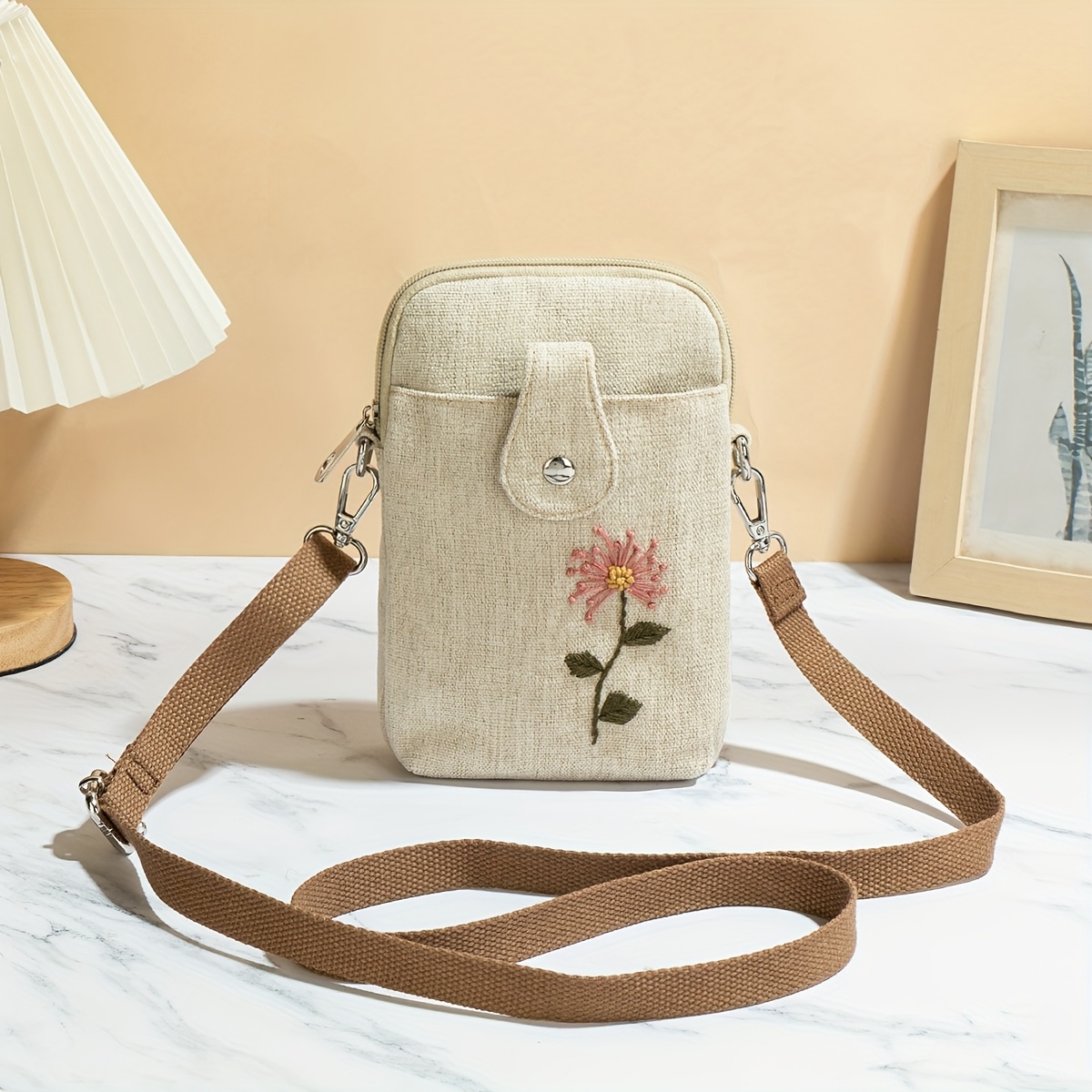 Image of A Handmade Bohemian-style Shoulder Bag With Random Cuts, Featuring Floral Stitching, Perfect For Christmas Gifts. Practical With Multiple Compartments For Phones And