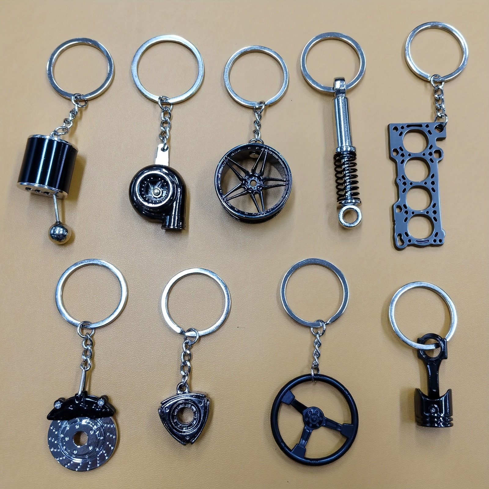 TEMU Cadeau de Noël, 9 porte-clés créatifs de modification de voiture, comprenant des leviers de vitesse, des turbos, des jantes, des amortisseurs,