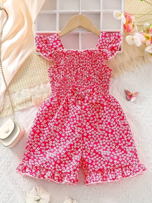 a sweet girl in and cute sleeveless jumpsuit with edges and a stylish bow summer and for outdoor