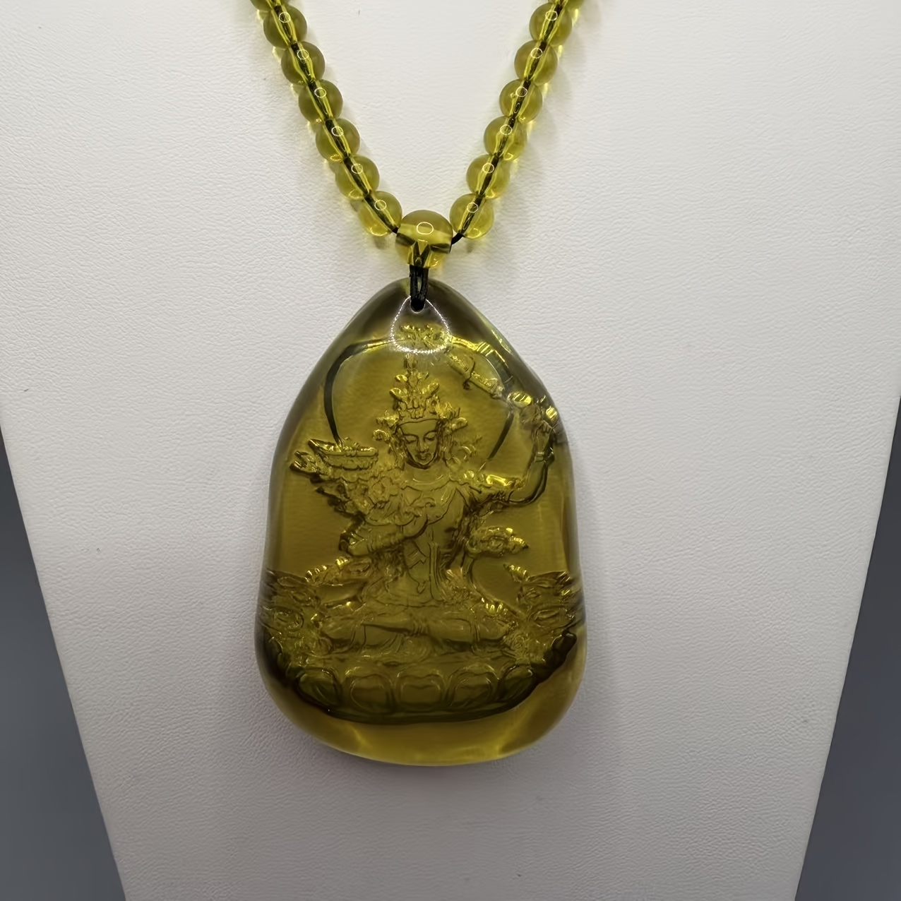 Dominican Amber Ksitigarbha Bodhisattva Pendant Necklace