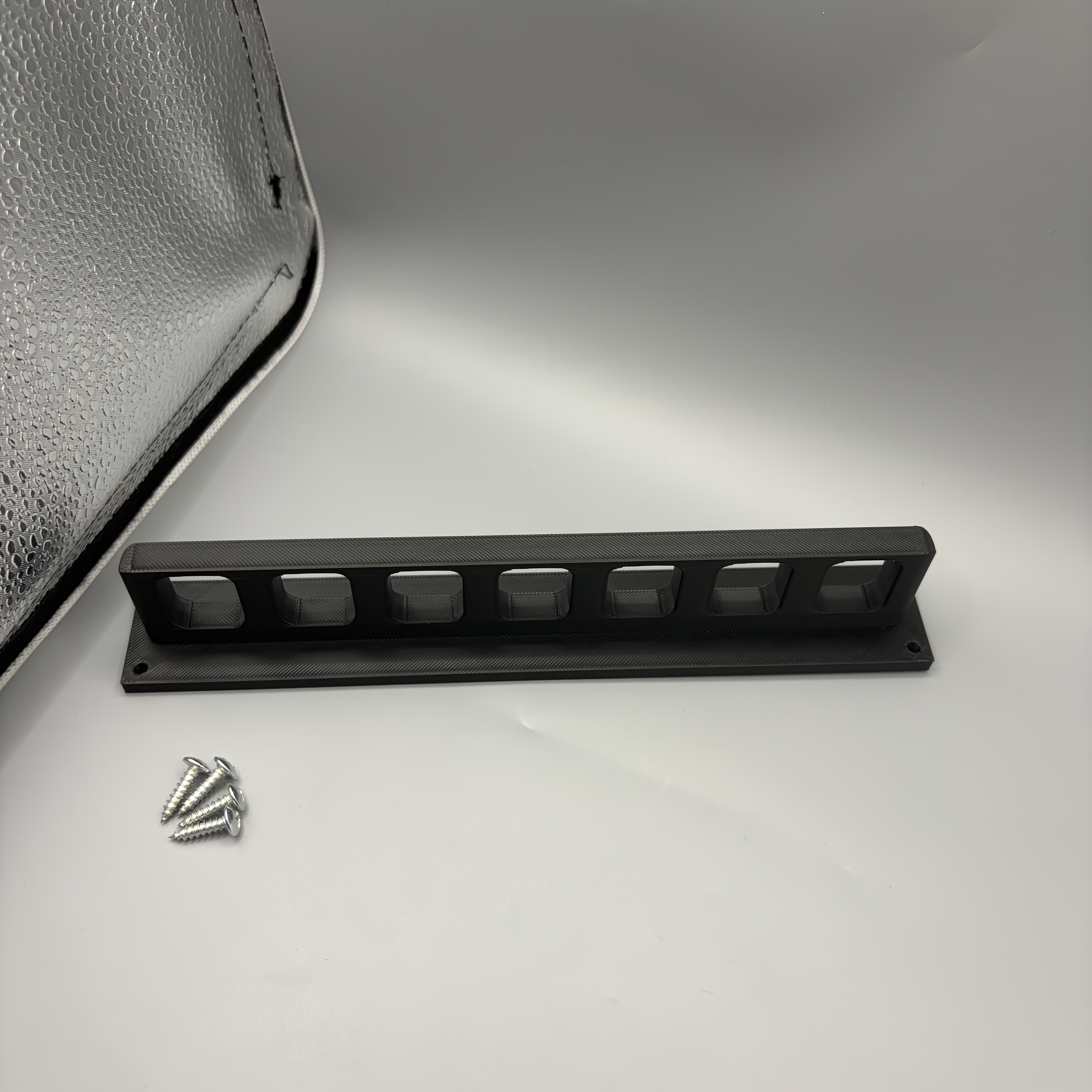 TEMU Organizador de alicates de pared negro de 7 ranuras (4 tornillos de montaje incluidos) Estante de almacenamiento colgante para herramientas