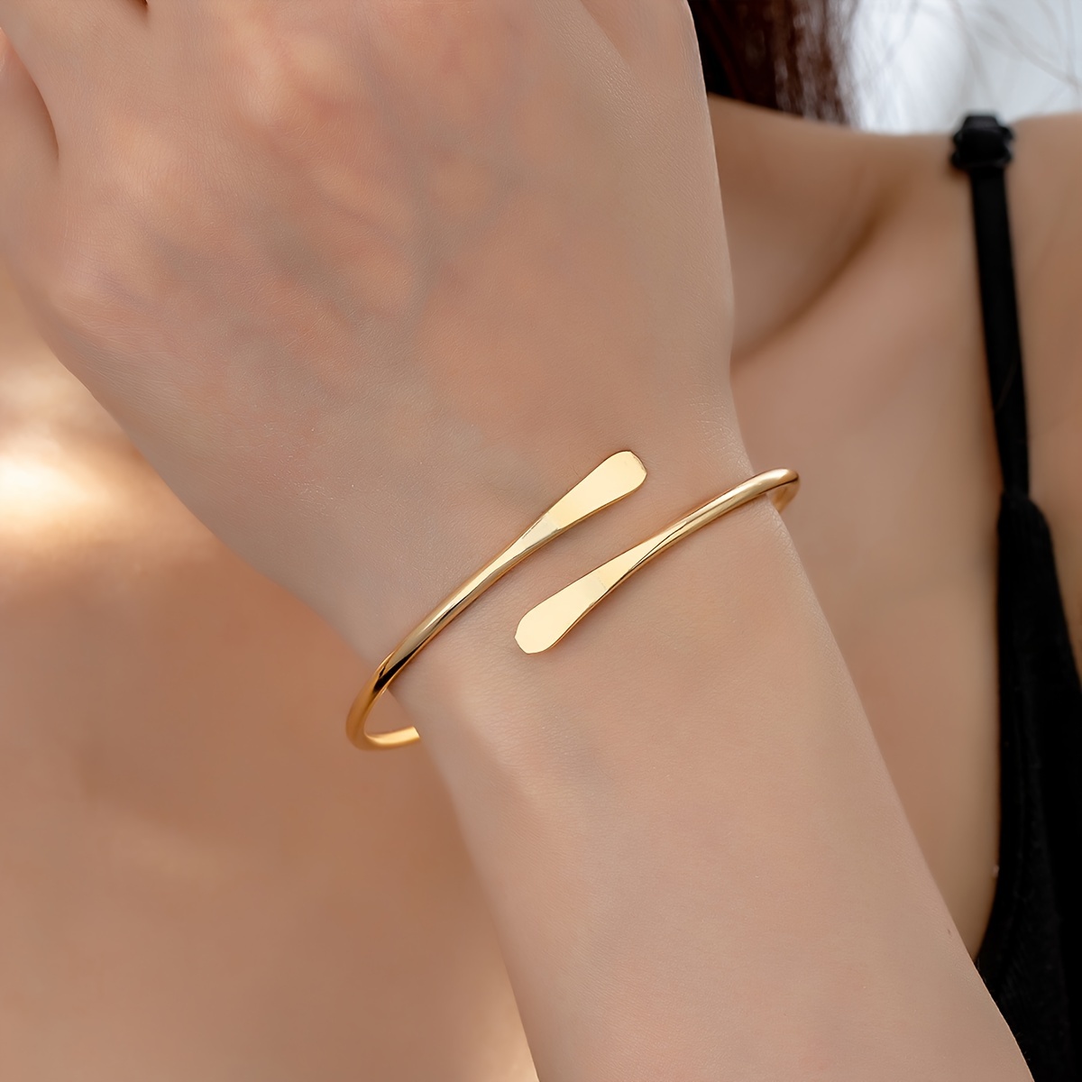 

Elegant Golden Open Bangle Bracelet, Simple Minimalist Design, Delicate Accessory For Daily Commute And Casual Wear