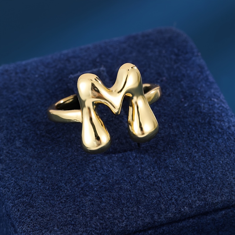 An Adjustable Women's Ring Designed With Creative English Letters